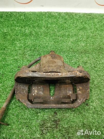 Суппорт тормозной передний правый Kia Ceed хетчбэк