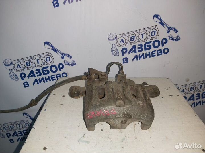 Суппорт тормозной левый Mitsubishi Pajero 2 2G72