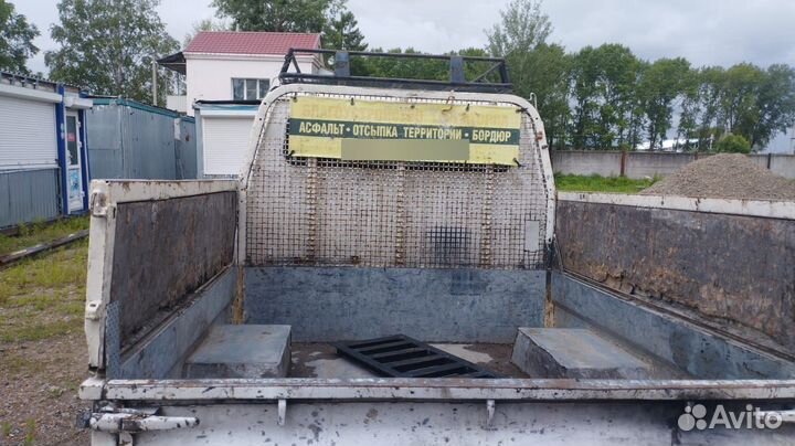 Самосвал и экскаватор