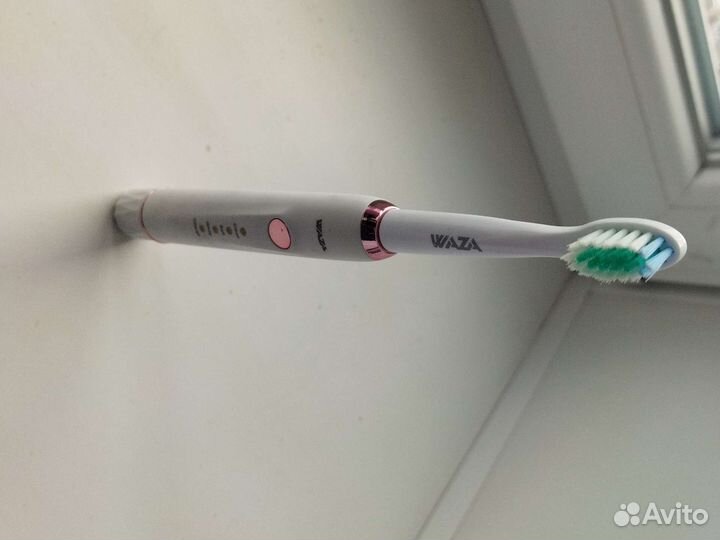 Электронная зубная щетка