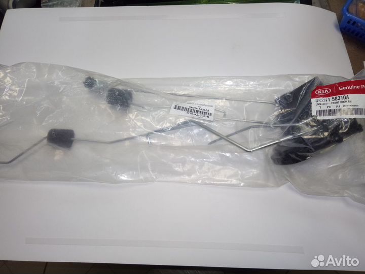 Защелка замка - замок двери Kia Spectra