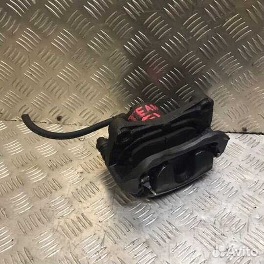 Суппорт тормозной передний левый Nissan Teana J32