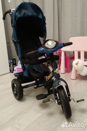 Трехколесный велосипед с ручкой