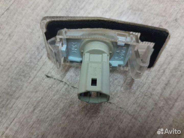 Фонарь подсветки номера Mazda Tribute I (2000—2004