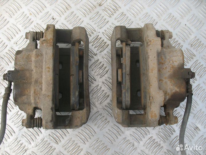 Суппорт передний левый Nissan X-Trail T30 2.2