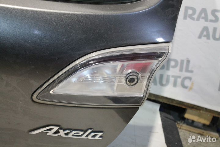 Фонарь в крышку багажника MAzda 3 BL