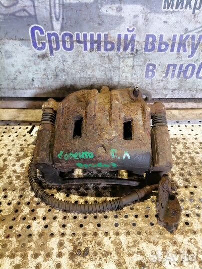 Суппорт передний левый Kia Sorento 1 2.4