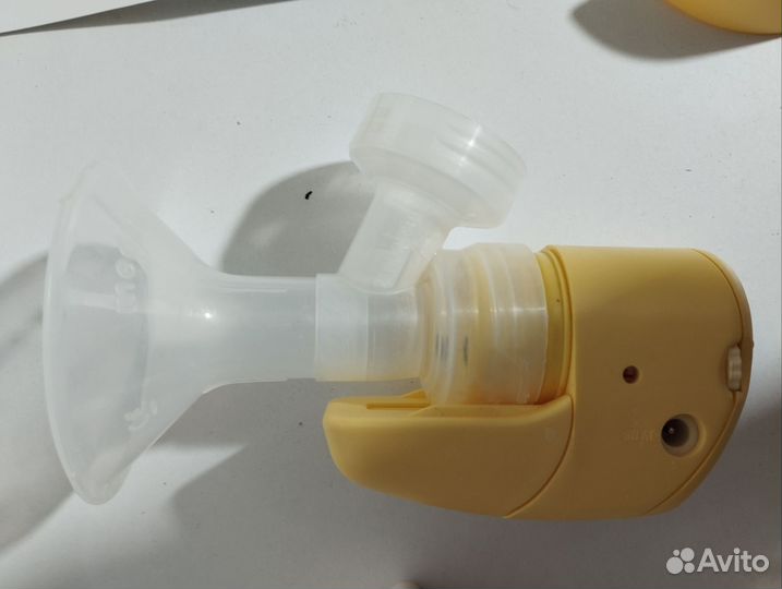 Молокоотсос medela электрический