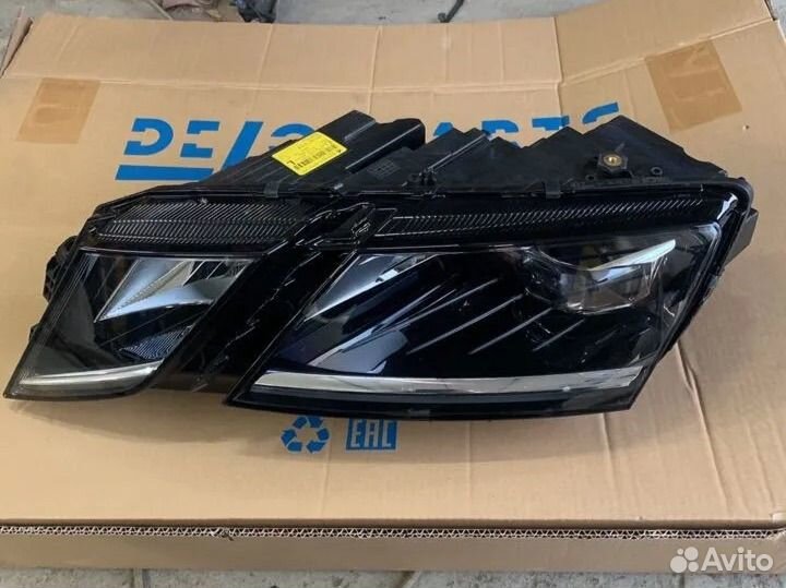 Фара левая Skoda Octavia A7