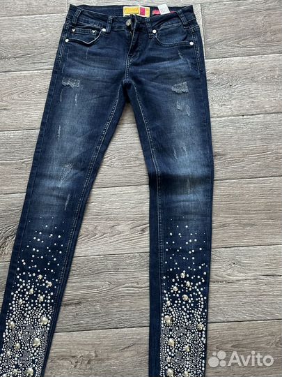 Джинсы узкие женские