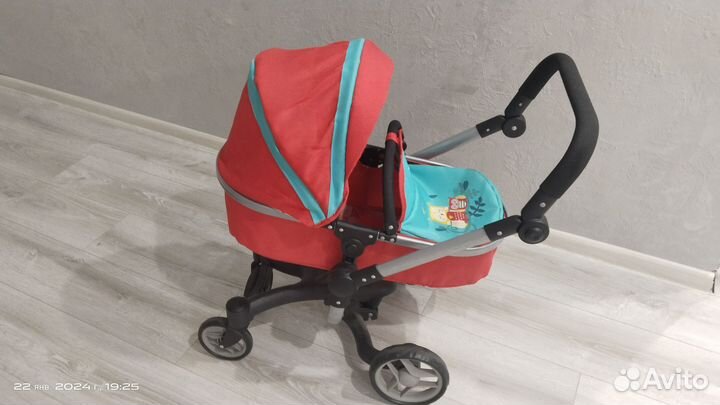 Детская игрушечная коляска
