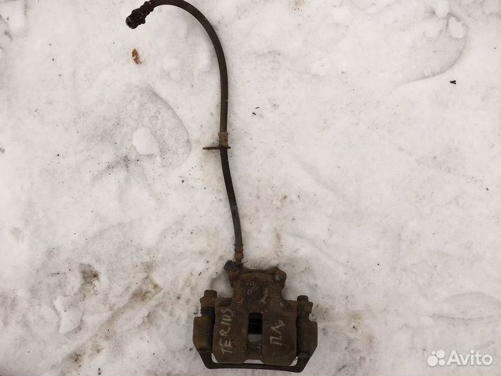 Передний левый суппорт Дайхатсу Териос 1