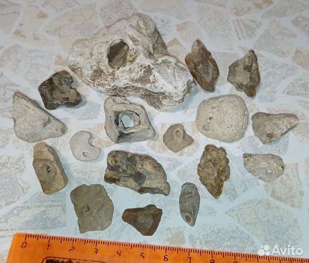 Камень с отверстиями