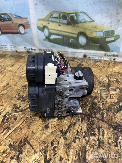 Блок ABS Мицубиси L200 4пок