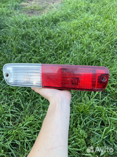 Фонарь левый задний в бампер Mitsubishi Pajero 3