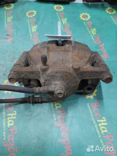 Суппорт передний левый Nissan Qashqai