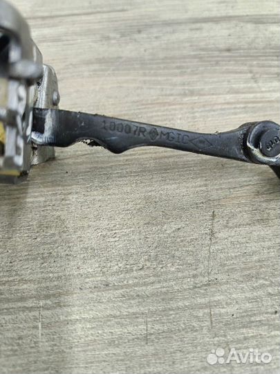 Ограничитель двери передний Renault Megane 3