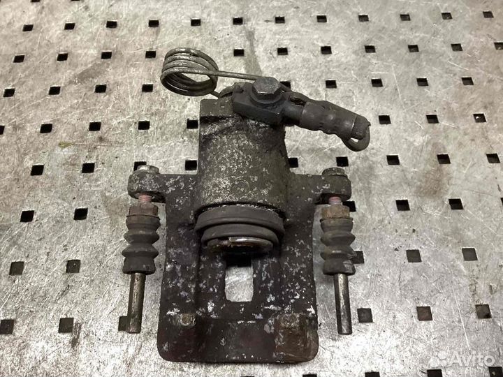 Суппорт задний левый Volkswagen Passat