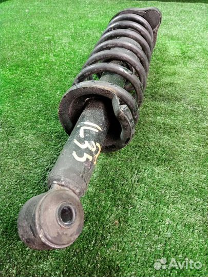 Стойка подвески задняя правая Mitsubishi Lancer 10