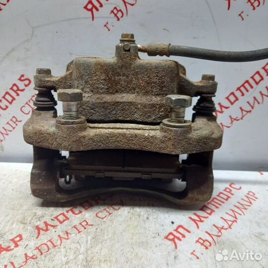 Суппорт тормозной передний правый Nissan X Trail