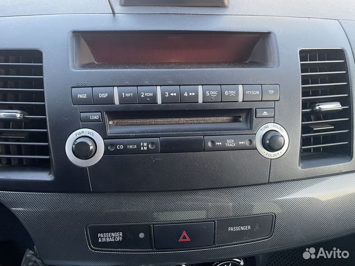 Штатная магнитола на ланцер 10