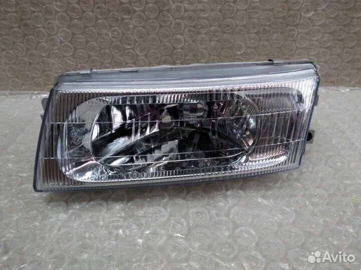 Фара левая Mitsubishi Lancer 1998-2000