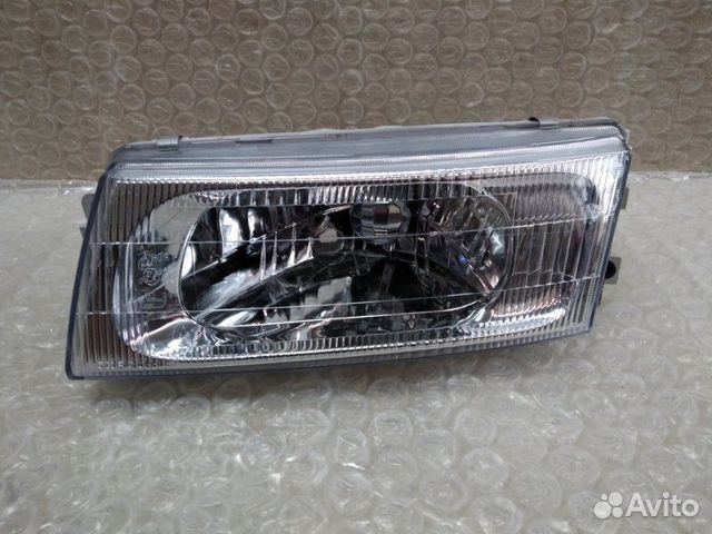 Фара левая Mitsubishi Lancer 1998-2000