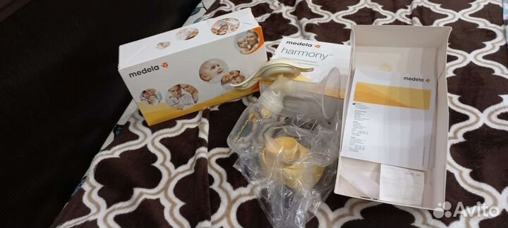 Молокоотсос medela ручной