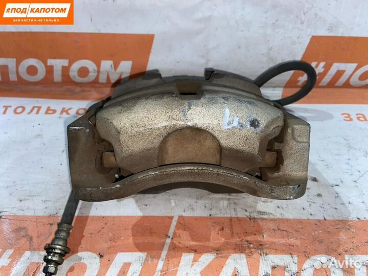 Суппорт тормозной передний левый Nissan X-Trail