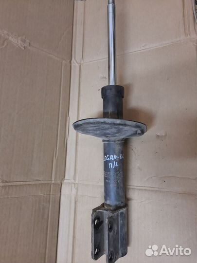 Стойка передняя левая Renault Logan 1