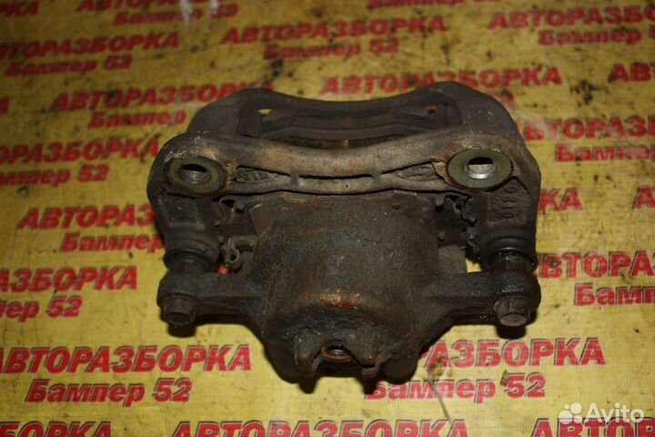 Суппорт тормозной передний левый Kia Rio