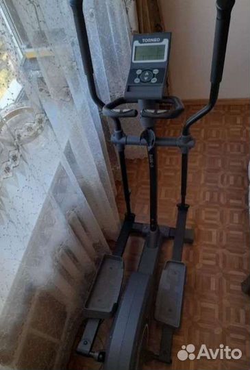Эллиптический тренажер torneo