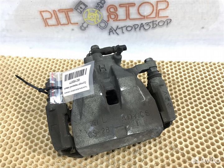 Суппорт передний левый Toyota Camry (ACV40,GSV40)