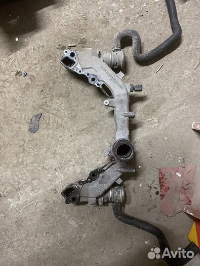 Фланец системы охлаждения двигателя