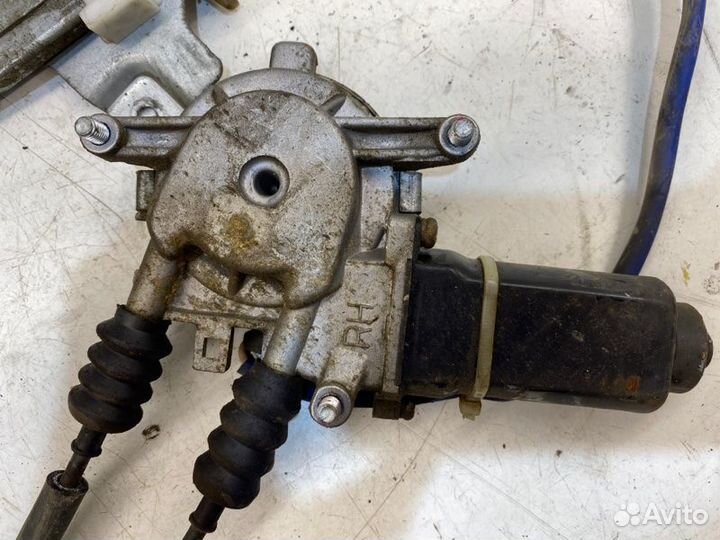 Мотор стеклоподъемника задний правый Kia Spectra