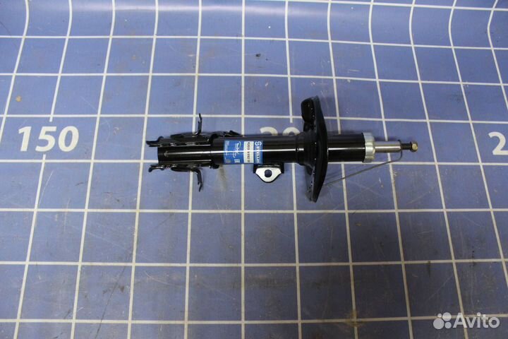Амортизатор передний левый Nissan Juke F15