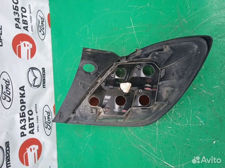 Фонарь задний левый Opel Astra H gtc