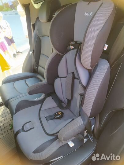 Детское автокресло / бустер siger
