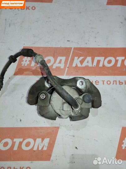 Суппорт тормозной передний левый Mazda 3 BK рест