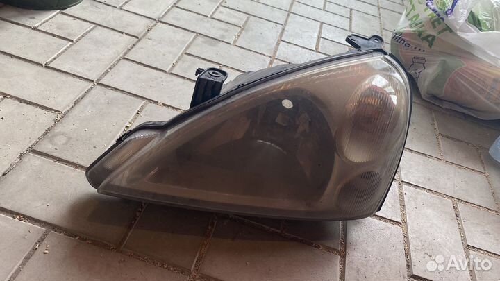 Фара suzuki liana левая