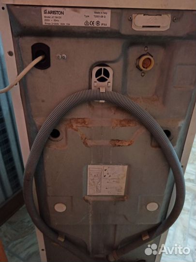 Стиральная машина Ariston с вертикальной загрузкой