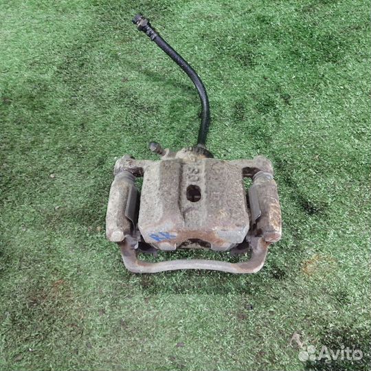 Суппорт тормозной задний левый Mitsubishi Legnum