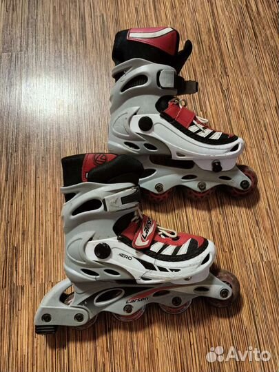 Роликовые коньки