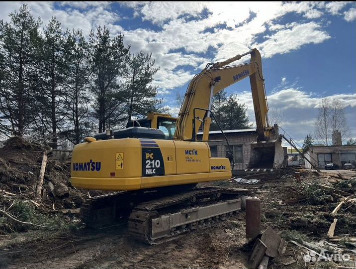 Услуги гусеничного экскаватора