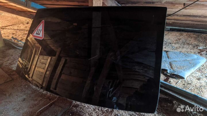 Стекло заднее renault logan