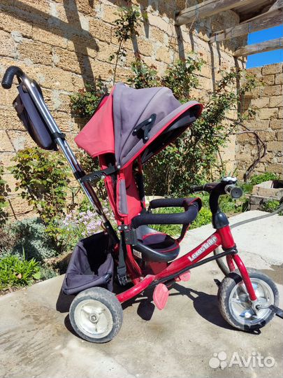 Детский велосипед с родительской ручкой