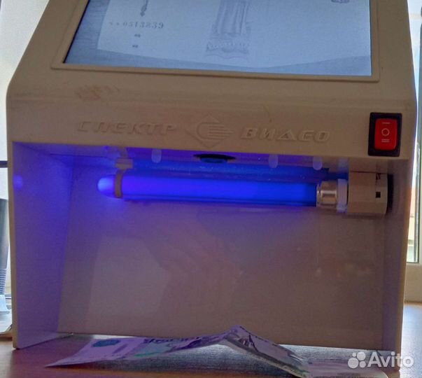 Оприделитель подлинности бумажных денег