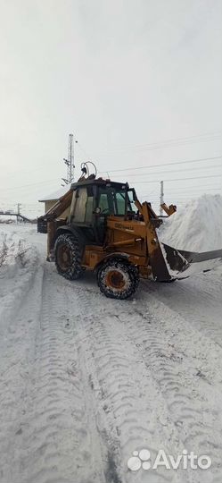 Экскаватор погрузчик Гидромолот
