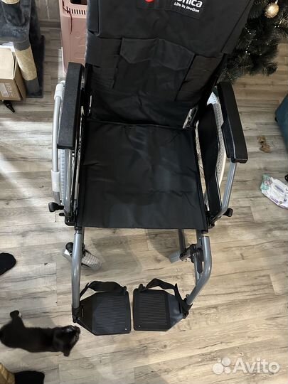 Новая инвалидная коляска