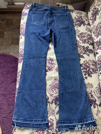 Джинсы клеш